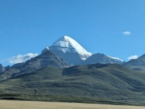 view of mountain kailash where peak is seen from fram distance after the hills 